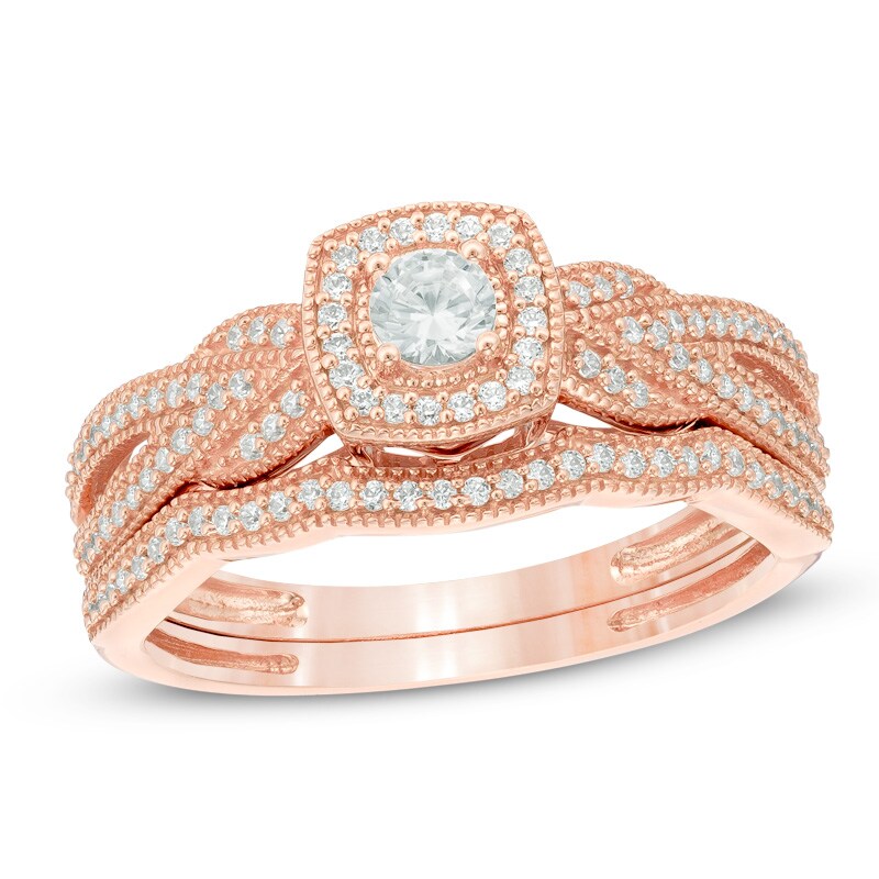 Main Image 1 of Previously Owned - 1/3 CT. T.W. Diamond Cushion Frame Vintage-Style Twist Shank Bridal Set in 10K Rose Gold