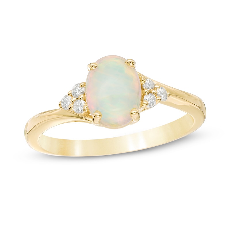 Previously Owned - Oval Opal and 1/10 CT. T.W. Diamond Tri-Sides Ring ...