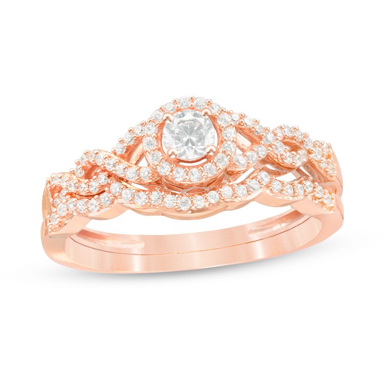 Main Image 1 of Previously Owned - 3/8 CT. T.W. Diamond Frame Twist Bridal Set in 10K Rose Gold