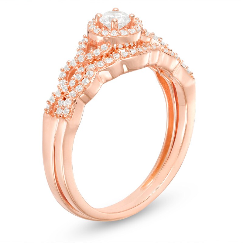 Main Image 2 of Previously Owned - 3/8 CT. T.W. Diamond Frame Twist Bridal Set in 10K Rose Gold