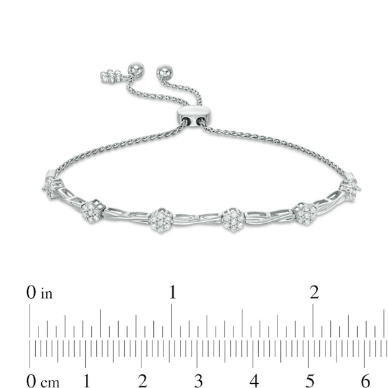Previously Owned - 3/8 CT. T.w. Diamond Composite Flower Twist Bolo Bracelet in 10K White Gold - 8.9"