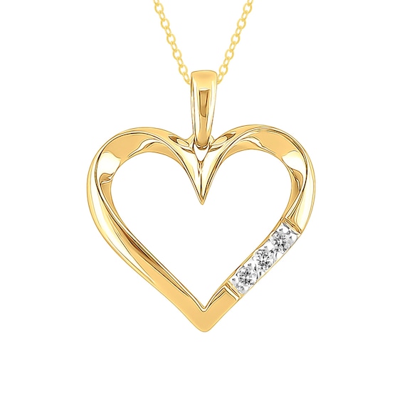Previously Owned - 1/20 CT. T.w. Diamond Three Stone Heart Pendant in 10K Gold