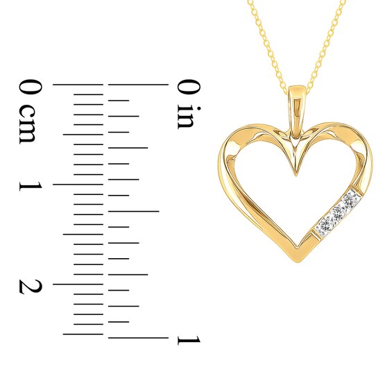 Previously Owned - 1/20 CT. T.w. Diamond Three Stone Heart Pendant in 10K Gold
