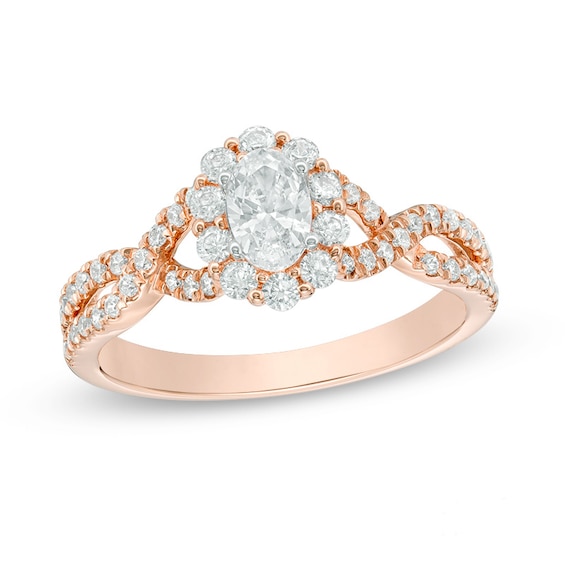 Previously Owned - Love's Destiny by Zales 7/8 CT. T.W. Oval Diamond Frame Twist Engagement Ring in 14K Rose Gold Previously Owned - Love's Destiny by Zales 7/8 CT. T.W. Oval Diamond Frame Twist Engagement Ring in 14K Rose Gold