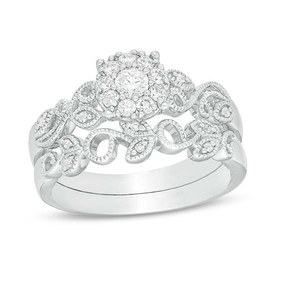 Previously Owned - Perfect Fit 1/3 CT. T.w. Diamond Frame Vine-Shank Interlocking Bridal Set in 10K White Gold