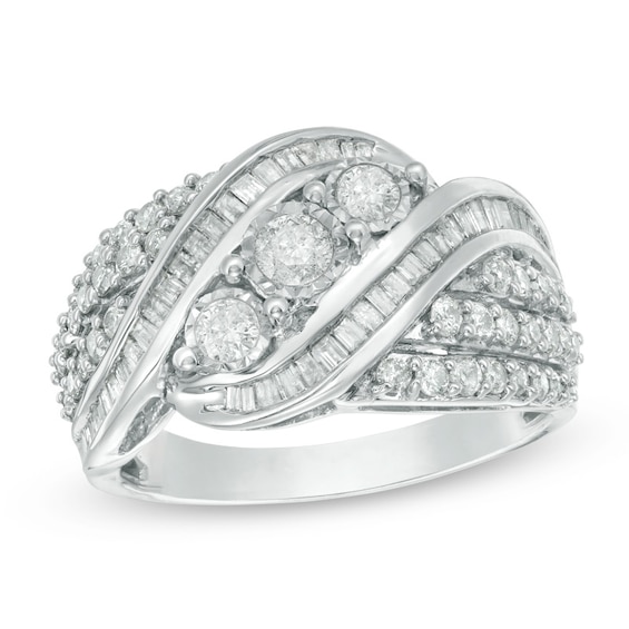 Previously Owned - 1 CT. T.w. Baguette and Round Diamond Three Stone Bypass Ring in Sterling Silver