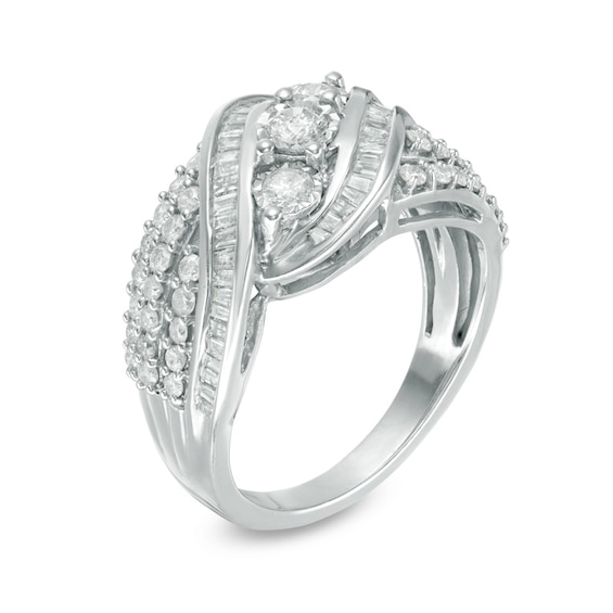 Previously Owned - 1 CT. T.w. Baguette and Round Diamond Three Stone Bypass Ring in Sterling Silver