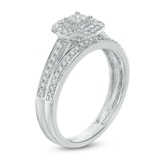Previously Owned - 1/4 CT. T.w. Diamond Cushion Frame Bridal Set in 10K White Gold