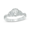 Thumbnail Image 1 of Previously Owned - 1/2 CT. T.W. Diamond Frame Twist Shank Engagement Ring in 10K White Gold