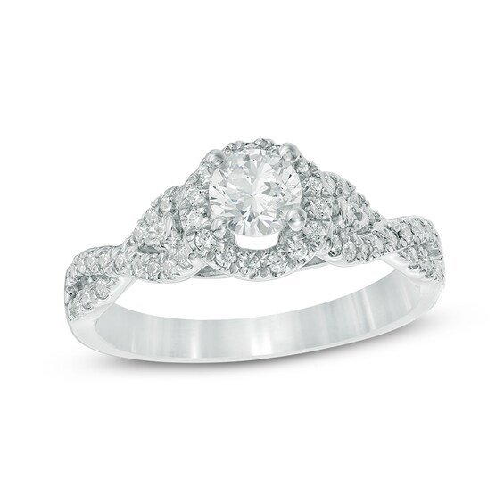 Previously Owned - 1/2 CT. T.w. Diamond Frame Twist Shank Engagement Ring in 10K White Gold