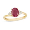 Thumbnail Image 1 of Previously Owned - Oval Ruby and 1/10 CT. T.W. Diamond Tri-Sides Ring in 10K Gold