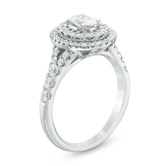 Previously Owned - Celebration Ideal 1-1/4 CT. T.w. Oval Diamond Double Frame Engagement Ring in 14K White Gold