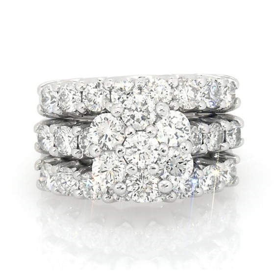 Previously Owned 4 CT. T.w. Diamond Soldered Bridal Set in 14K White Gold