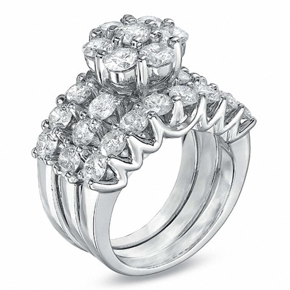 Previously Owned 4 CT. T.w. Diamond Soldered Bridal Set in 14K White Gold