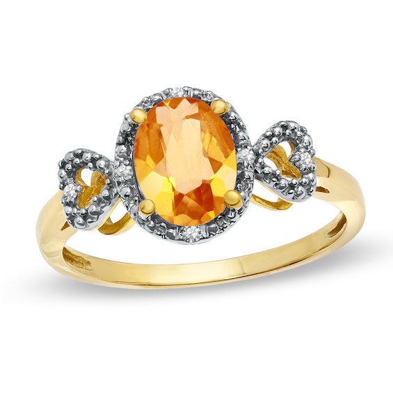 Previously Owned - Oval Citrine and Diamond Accent Ring in 10K Gold