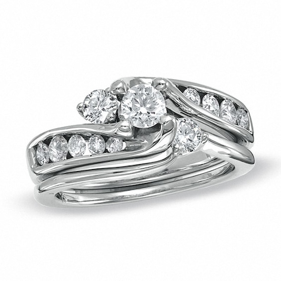 Previously Owned - 1 CT. T.w. Diamond Three Stone Slant Bridal Set in 14K White Gold