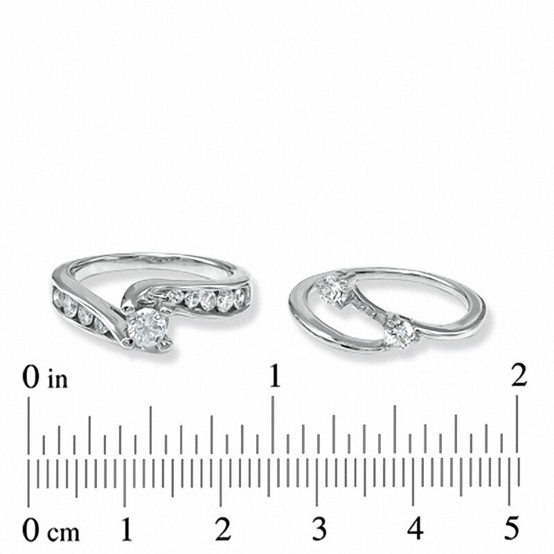 Main Image 3 of Previously Owned - 1 CT. T.W. Diamond Three Stone Slant Bridal Set in 14K White Gold