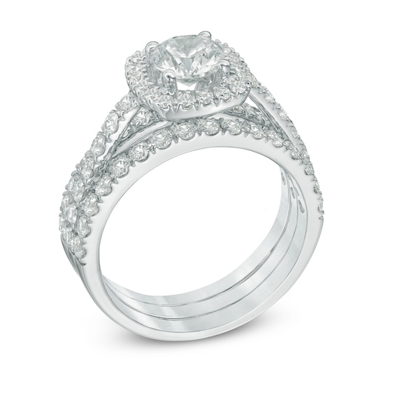 Previously Owned - 2-1/5 CT. T.w. Diamond Frame Three Piece Bridal Set in 14K White Gold