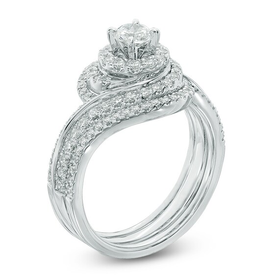 Previously Owned - 1 CT. T.w. Diamond Swirl Frame Three Piece Bridal Set in 14K White Gold