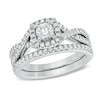 Thumbnail Image 1 of Previously Owned - Celebration Ideal 1 CT. T.W. Diamond Frame Bridal Set in 14K White Gold (I/I1)