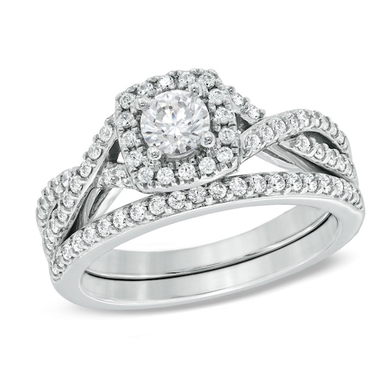 Previously Owned - Celebration Ideal 1 CT. T.w. Diamond Frame Bridal Set in 14K White Gold (I/I1)