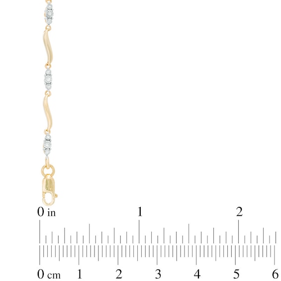 Previously Owned - 1/8 CT. T.w. Diamond Three Stone Curved Station Bracelet in 10K Gold
