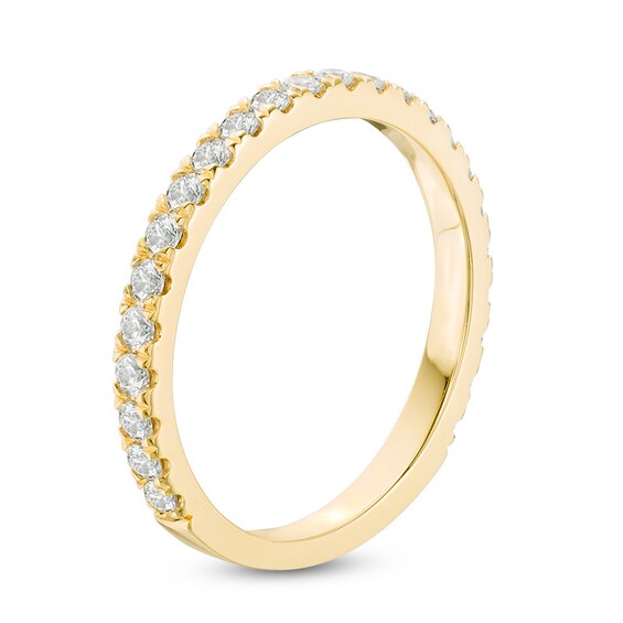 Previously Owned - YOU by Jean Doussetâ¢ 1/2 CT. T.w. Diamond Anniversary Band in 14K Gold (I/Si2)