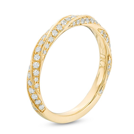 Previously Owned - YOU by Jean Doussetâ¢ 1/2 CT. T.w. Diamond Twist Anniversary Band in 14K Gold (I/Si2)