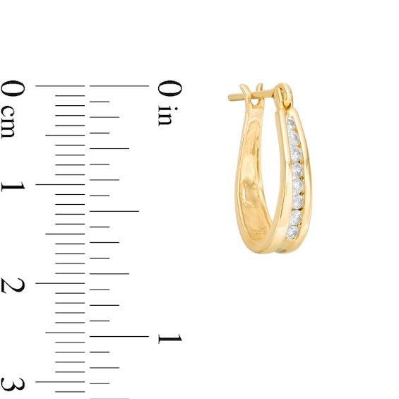 Previously Owned - 1/4 CT. T.w. Channel-Set Diamond Oval Hoop Earrings in 14K Gold