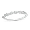 Thumbnail Image 1 of Previously Owned - 1/10 CT. T.W. Diamond Twist Anniversary Band in 10K White Gold
