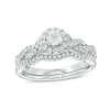 Thumbnail Image 1 of Previously Owned - 1/2 CT. T.W. Diamond Frame Twist Bridal Set in 10K White Gold
