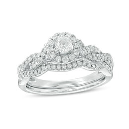 Previously Owned - 1/2 CT. T.W. Diamond Frame Twist Bridal Set in 10K White Gold