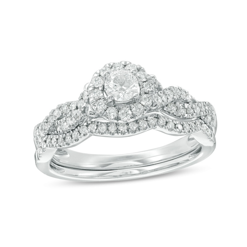 Main Image 1 of Previously Owned - 1/2 CT. T.W. Diamond Frame Twist Bridal Set in 10K White Gold