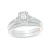 Thumbnail Image 1 of Previously Owned - Perfect Fit 1/2 CT. T.W. Emerald-Cut Diamond Frame Vintage-Style Interlocking Bridal Set in 10K White Gold