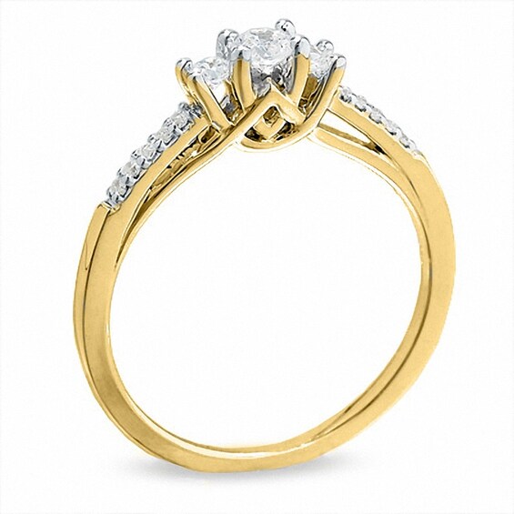 Previously Owned - 1/3 CT. T.w. Diamond Three Stone Ring in 10K Gold