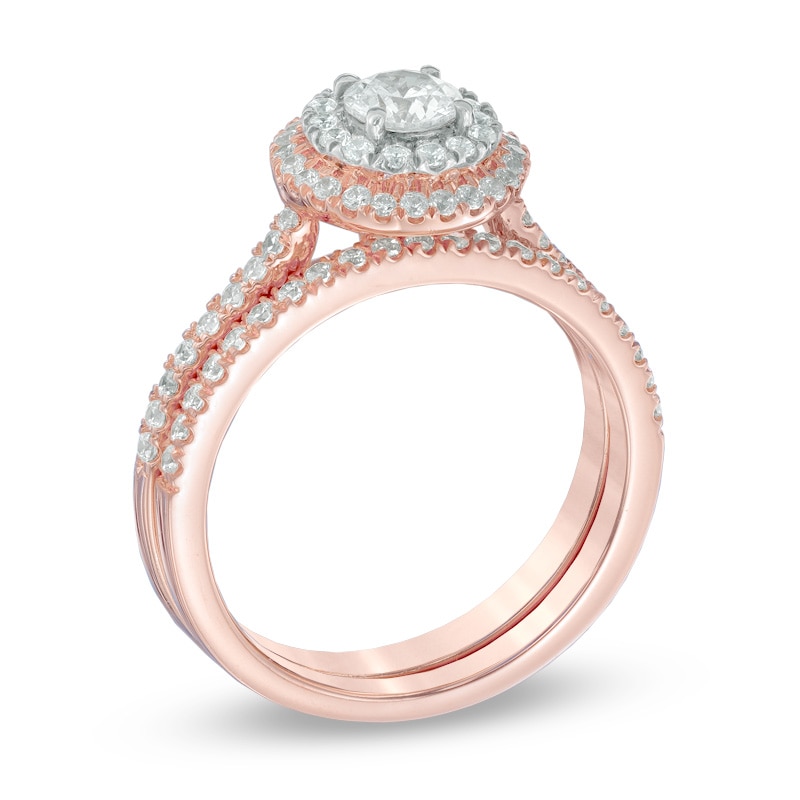 Previously Owned Celebration Ideal 7/8 CT. T.W. Diamond Double Frame Soldered Bridal Set in 14K Rose Gold (I/I1)