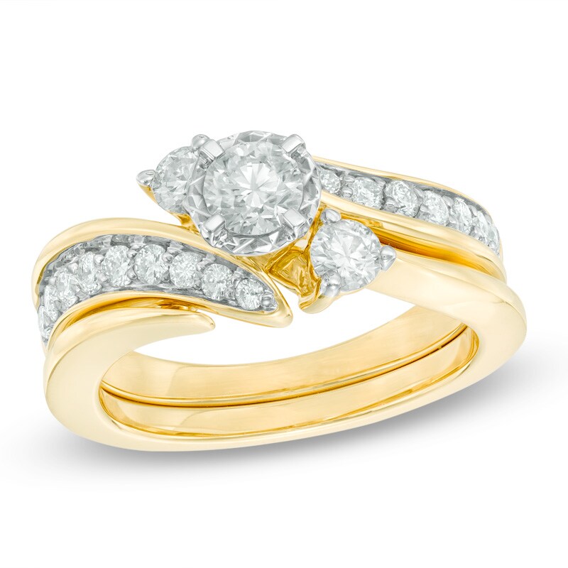 Main Image 1 of Previously Owned - 1 CT. T.W. Diamond Three Stone Slant Bridal Set in 14K Gold