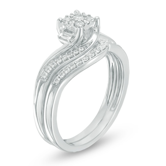 Previously Owned - 1/3 CT. T.w. Composite Diamond Bypass Swirl Bridal Set in 10K White Gold