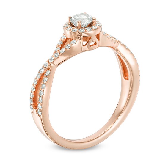 Previously Owned - 1/2 CT. T.w. Diamond Frame Twist Shank Engagement Ring in 14K Rose Gold