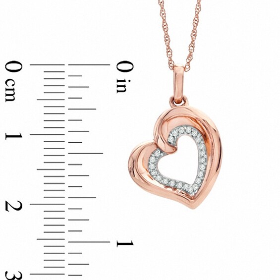 Previously Owned - 1/10 CT. T.w. Diamond Tilted Heart Pendant in 10K Rose Gold