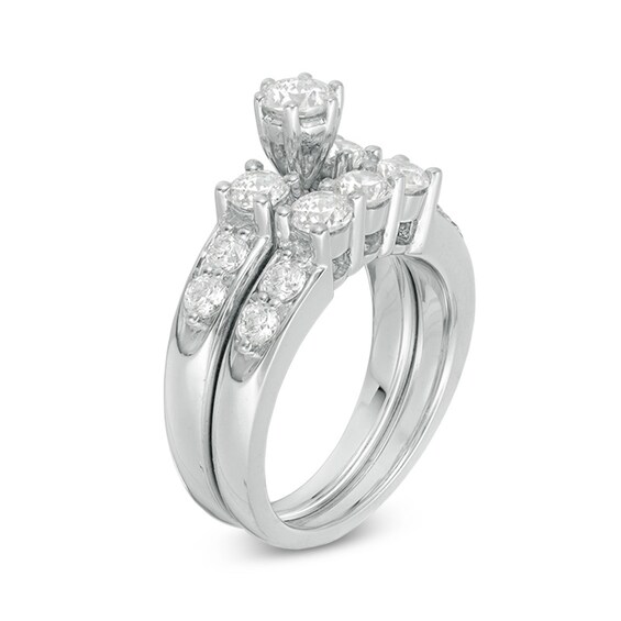 Previously Owned - 2 CT. T.w. Diamond Three Stone Bridal Set in 14K White Gold