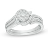 Thumbnail Image 1 of Previously Owned 1/2 CT. T.W. Diamond Swirl Bypass Frame Soldered Bridal Set in 10K White Gold