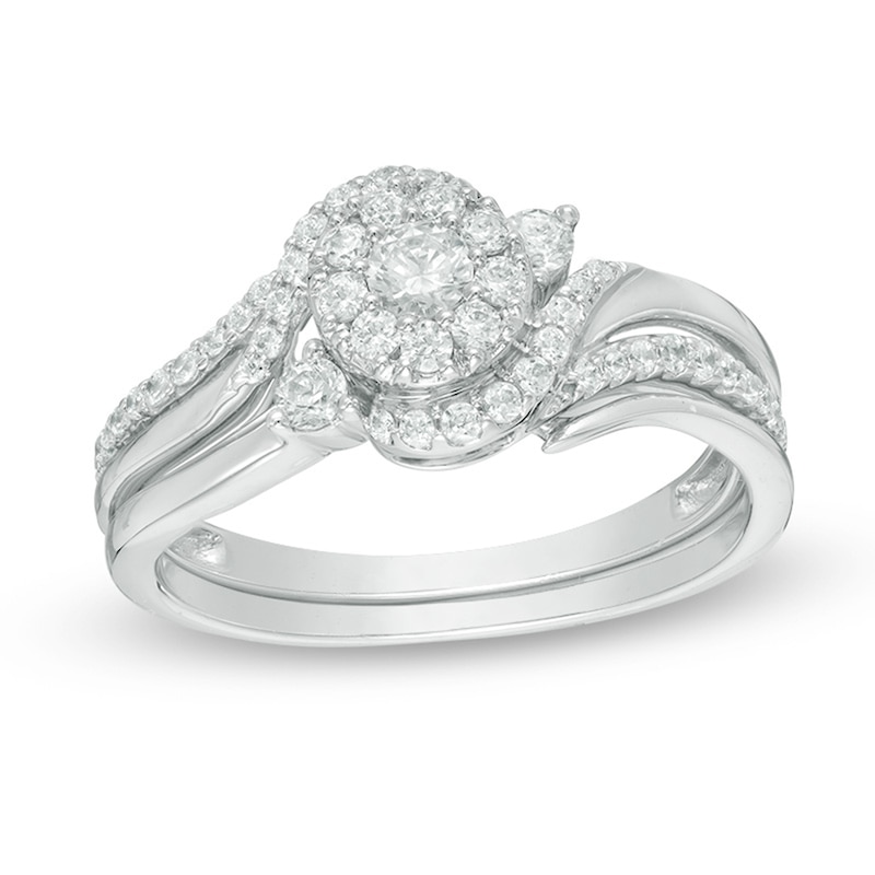 Main Image 1 of Previously Owned 1/2 CT. T.W. Diamond Swirl Bypass Frame Soldered Bridal Set in 10K White Gold