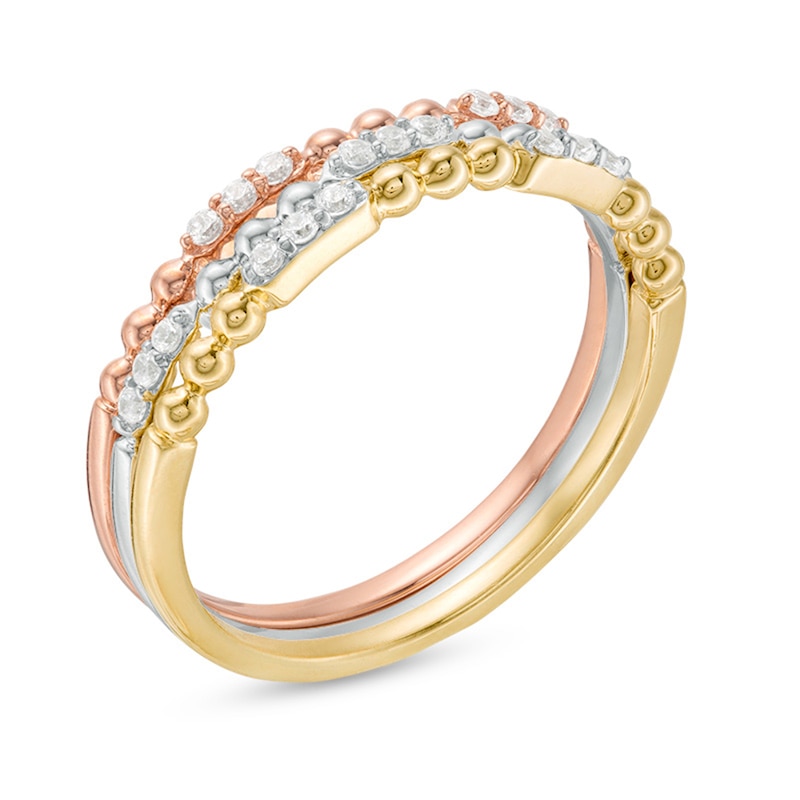 Previously Owned - 1/6 CT. T.W. Diamond and Beaded Three Piece Stackable Band Set in 10K Tri-Tone Gold