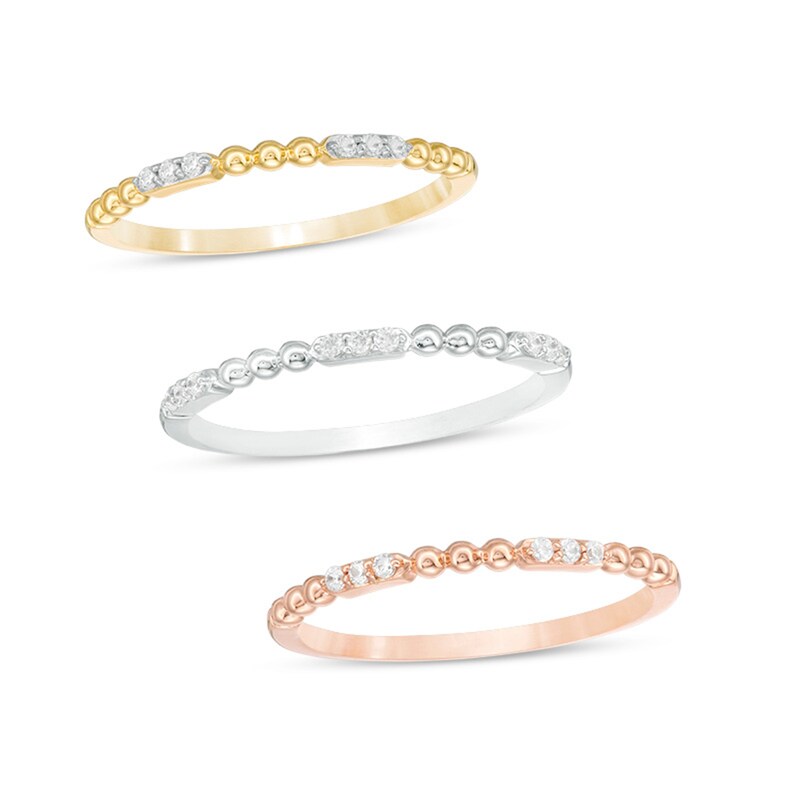 Previously Owned - 1/6 CT. T.W. Diamond and Beaded Three Piece Stackable Band Set in 10K Tri-Tone Gold