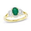 Thumbnail Image 1 of Previously Owned - Oval Emerald and 1/6 CT. T.W. Diamond Three Stone Collar Ring in 10K Gold