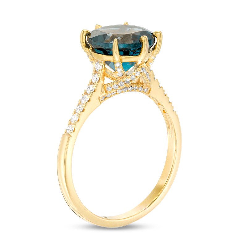 Main Image 2 of Previously Owned - 9.0mm London Blue Topaz and 1/4 CT. T.W. Diamond Ring in 14K Gold