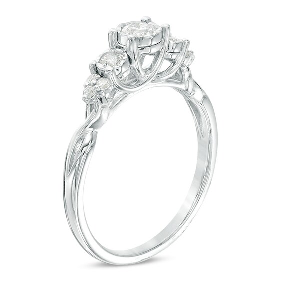 Previously Owned - 1/3 CT. T.w. Diamond Past Present FutureÂ® Tri-Sides Twist Shank Engagement Ring in 10K White Gold