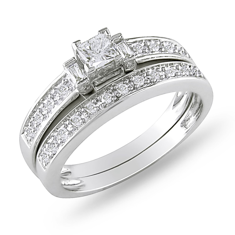 Main Image 1 of Previously Owned - 1/3 CT. T.W. Princess-Cut and Baguette Diamond Three Stone Bridal Set in Sterling Silver
