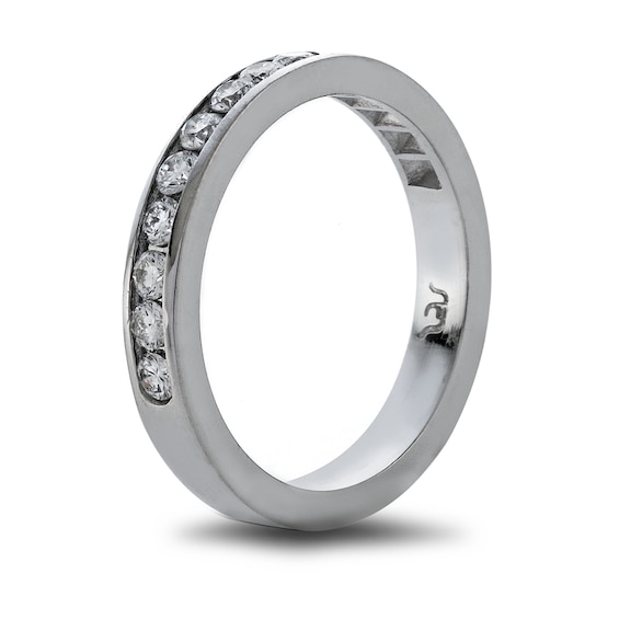 Previously Owned - 1/4 CT. T.w. Diamond Nine Stone Wedding Band in Platinum (H/Si1)